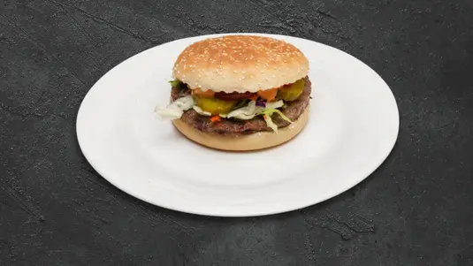 A hearty burger with rich, savoury flavour. — delivery in Upton E13