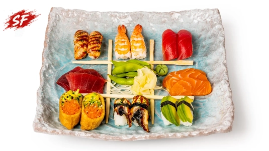 2 Shake Yaki Salmon Nigiri, 2 Tuna Nigiri, 2 Ebi Nigiri, 2 Eel Nigiri, 2 Avocado Nigiri, 2 Inari Nigiri, 3 Salmon Sashimi & 3