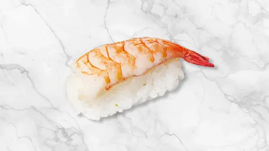 Cooked prawn pressed over seasoned sushi rice. — collection in Hacton