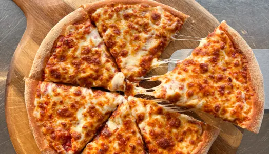 Topped with mozzarella cheese, rich tomato sauce and 4 free toppings of your choice — collection in Manor Park E12