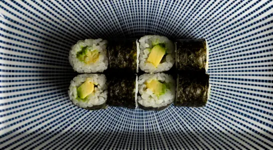 Smooth avocado wrapped in seasoned rice & nori for a fresh vegan option. — delivery in Simpson MK6