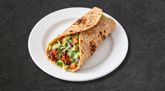 Chicken tikka boti with tamarind, green chutney & onions in a roti. — delivery in Tipner PO2