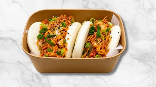 Two fluffy bao buns filled with crunchy chicken tenders, fresh salad and our rose-infused Korean sauce.
