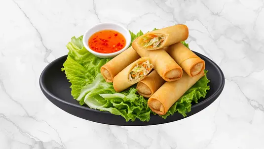 Crispy spring rolls filled with mixed vegetables. — delivery in Cranham RM14