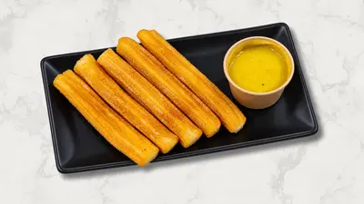 Churro Sticks with caramel sauce
