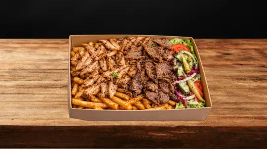 A selection of grilled meats served with fresh salad and your choice of sauces. — delivery in Mill Green